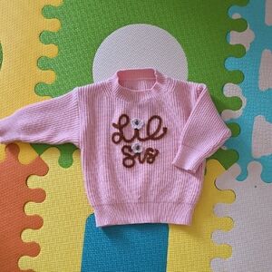 Pink Knit Sweater with Floral Design